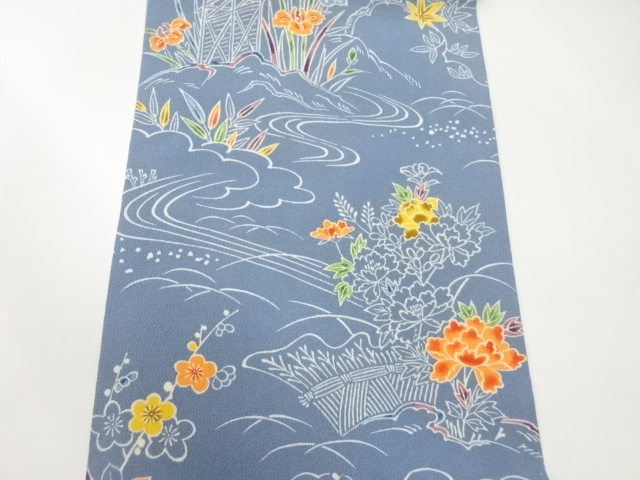  縮緬地柴垣に流水・草花模様名古屋帯